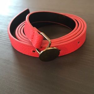 Red orange belt with unique silver buckle NWOT